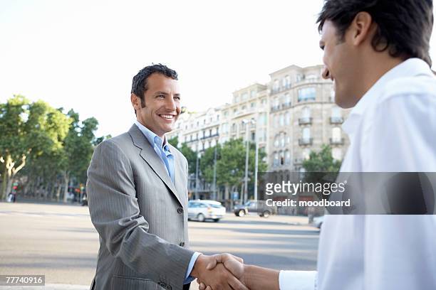 businessmen shaking hands - mediterranean culture stock pictures, royalty-free photos & images