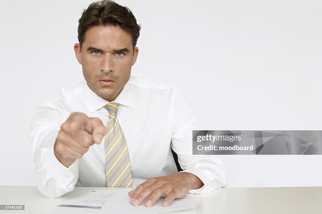 Businessman Pointing Finger