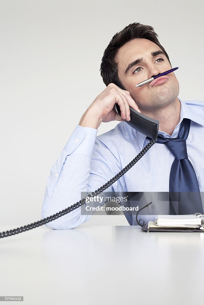 Bored Businessman on Phone