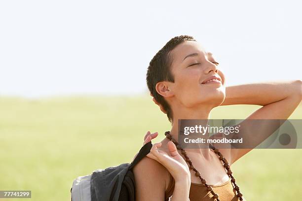 hiker in field - crew cut stock pictures, royalty-free photos & images