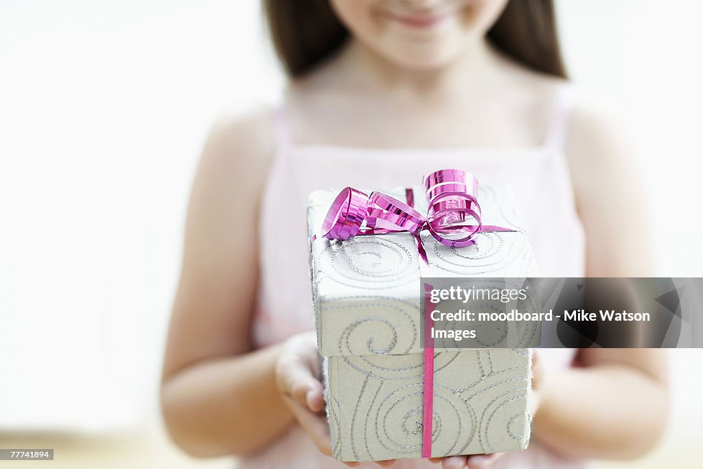 Smiling Girl with Gift