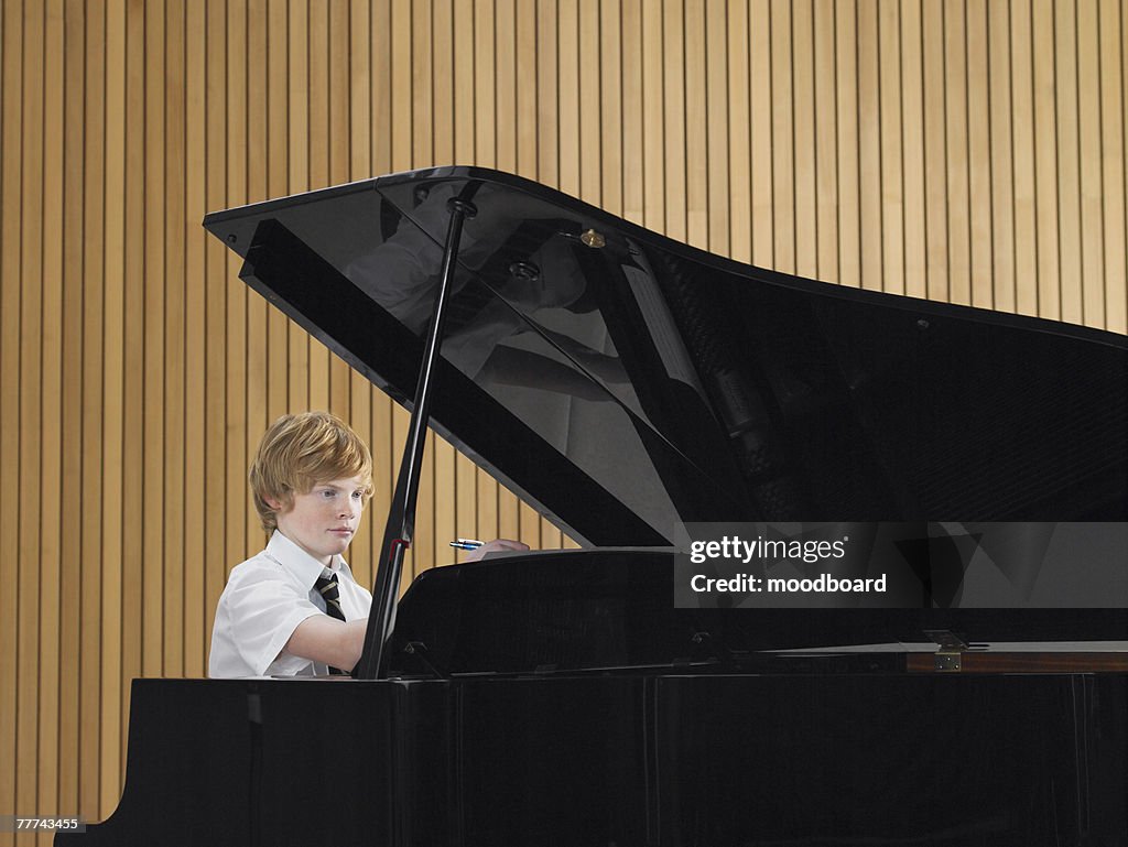 High School Student Practicing Piano