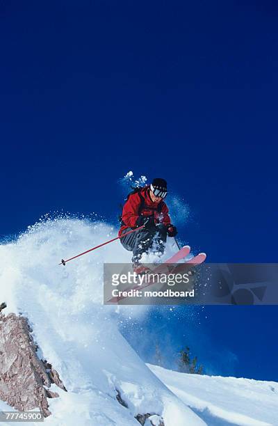 skier jumping - ski jumping stock-fotos und bilder