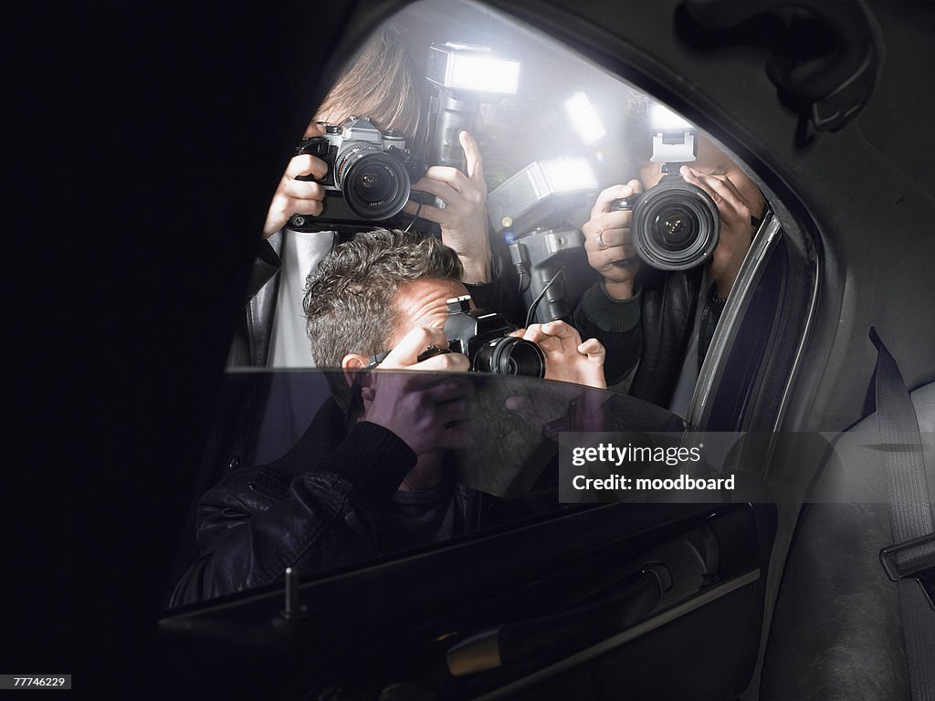 Paparazzi Shooting Inside a Limousine