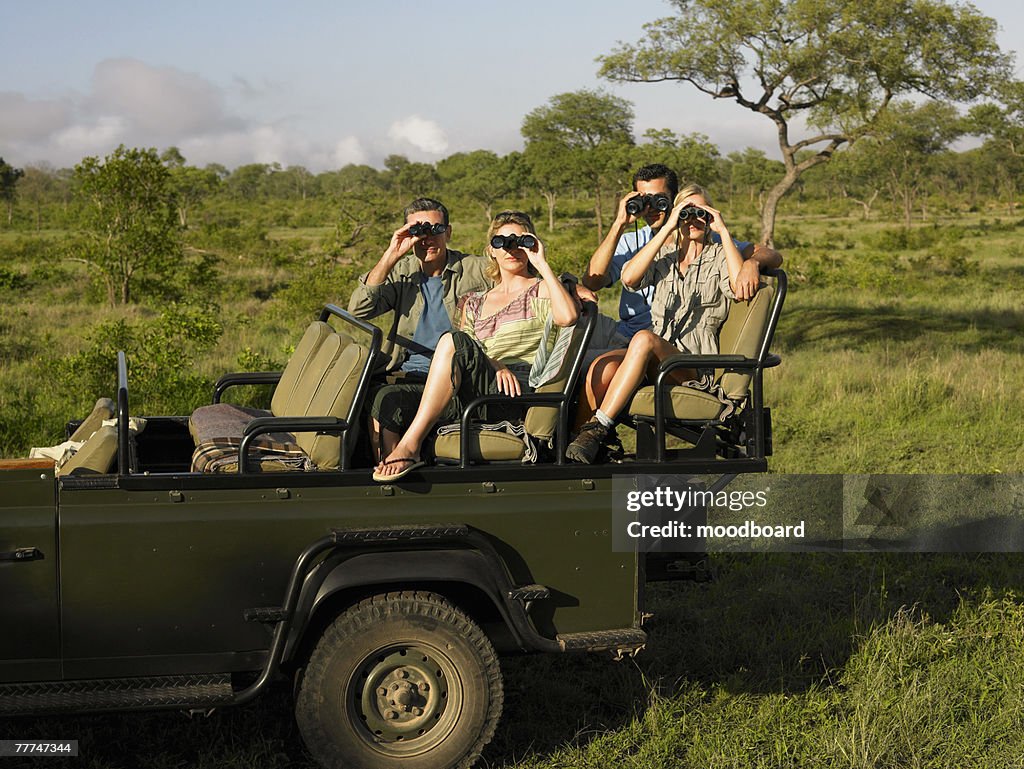 people-on-a-safari-vacation-watching-wildlife.jpg