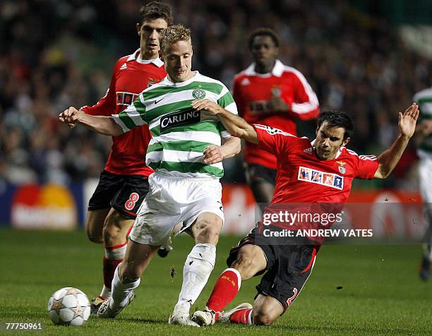 Jiri Jarosik of Celtic vies with Luis Filipe of Benfica during the Champions League group D football match at Celtic Park, Glasgow, Scotland, 06...