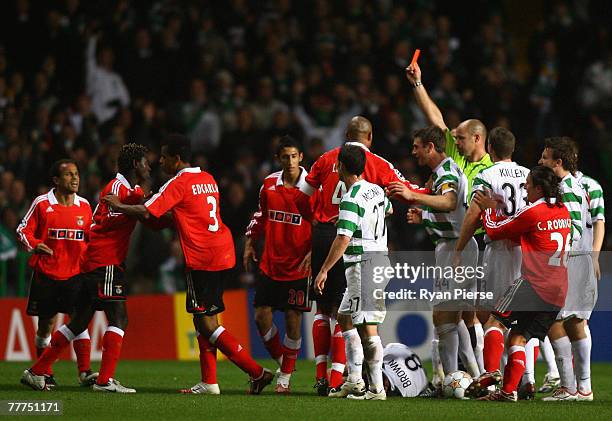 Gilles Binya of Benfica is shown a red card after clashing with Scott Brown of Celtic during the UEFA Champions League Group D match between Celtic...