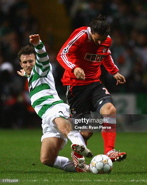 Lee Naylor of Celtic tackles Cristian Rodriguez of Benfica during the UEFA Champions League Group D match between Celtic and Benfica at Celtic Park...