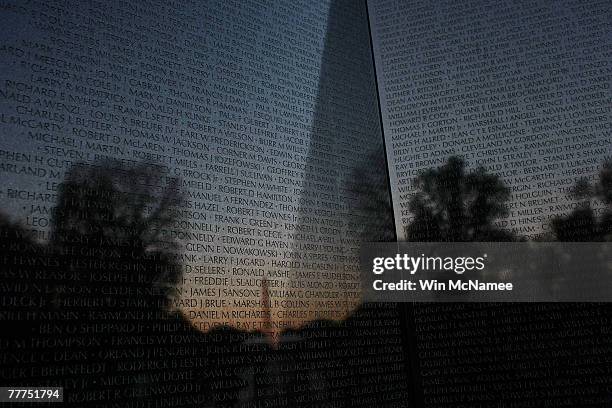 Some of the more than 53,000 names of U.S. Causalities carved into the Vietnam Veterans Memorial are shown November 6, 2007 in Washington, DC. The...