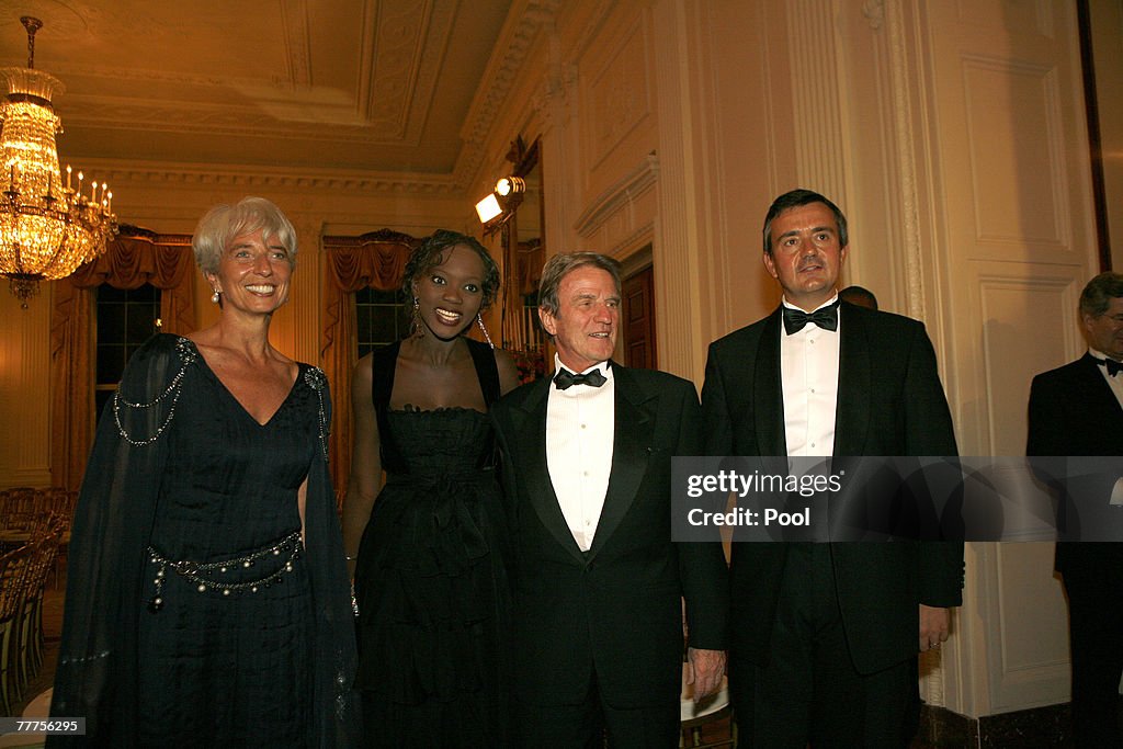 President And Mrs. Bush Welcome French President To White House