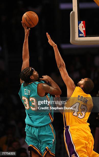 Melvin Ely of the New Orleans Hornets shoots over Brian Cook of the Los Angeles Lakers on November 6, 2007 at Staples Center in Los Angeles,...