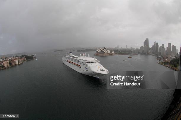 In this handout photo supplied by Torstar Communications, Australia's first superliner, P&O Cruises Pacific Dawn, arrives in Sydney Harbour ahead of...