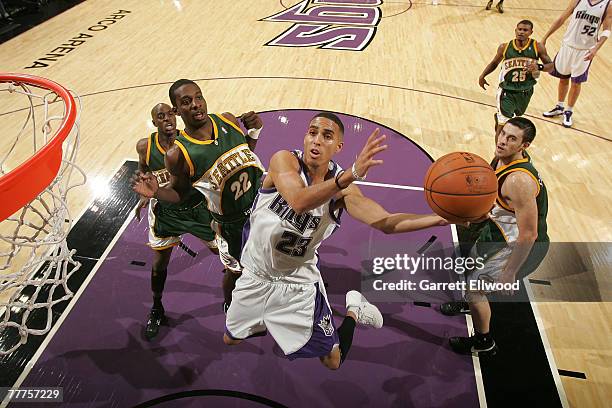 Kevin Martin of the Sacramento Kings goes to the basket against Jeff Green of the Seattle Supersonics on November 6, 2007 at Arco Arena in...