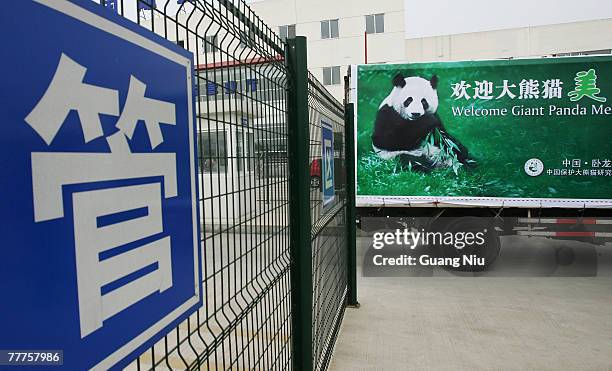 Truck with the San Diego Zoo born 4-year-old giant panda Mei Sheng leaves Shuangliu airport on November 7, 2007 in Chengdu, capital of Southwest...