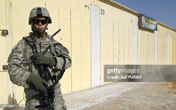 Soldier patrols an area in central Baghdad, 07 November 2007. Former chief United Nations weapons inspector Hans Blix said today he feared the United...