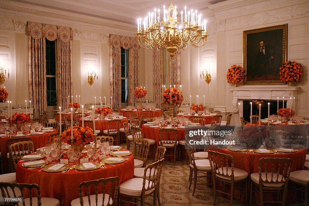 President And Mrs. Bush Welcome French President To White House