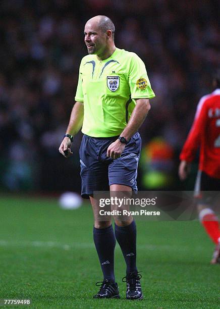 Referee Martin Hansson of Sweden looks on during the UEFA Champions League Group D match between Celtic and Benfica at Celtic Park on November 6,...