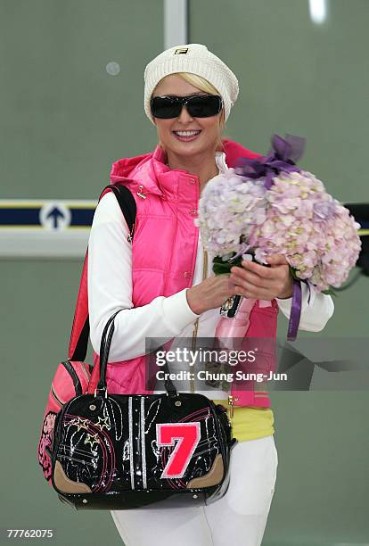 Socialite Paris Hilton arrives at Gimpo Airport on November 7, 2007 in Seoul, South Korea. Hilton is in South Korea for a FILA advertising campaign.