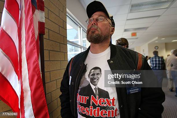 Marvin Fowler watches on a monitor as Democratic Presidential hopeful Senator Barack Obama delivers a policy speech at the Mississippi Bend Area...