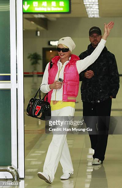 Paris Hilton arrives at Gimpo International Airport, on November 7 in Seoul, South Korea.