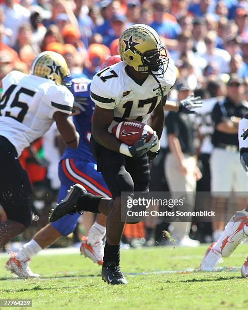 Running back D.J. Moore of the Vanderbilt Commodores runs up field for a few yards against the Florida Gators during the game at Ben Hill Griffin...