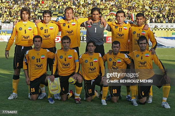 Iran's Sepahan players pose for a group picture before the first leg of the AFC Champions League final football match against Japan's Orawa Reds in...