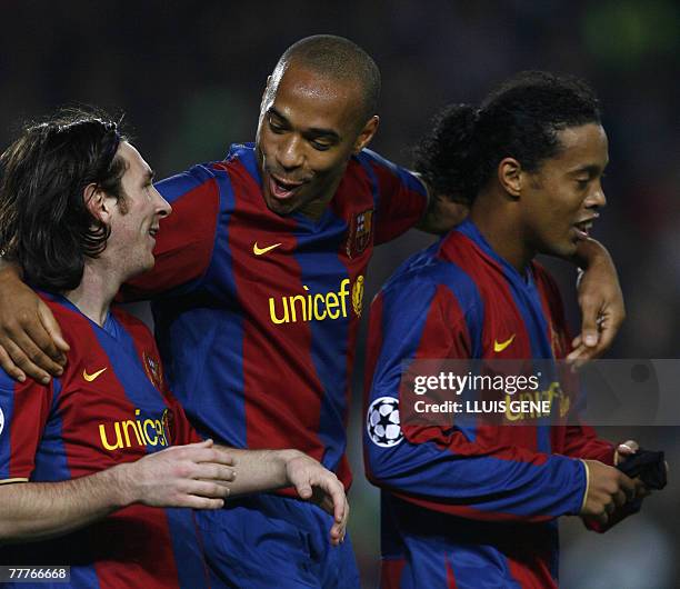Barcelona's Argentinian Leo Messi celebrates with French Thierry Henry and Brazilian Ronaldinho after scoring against Glasgow Rangers during a...