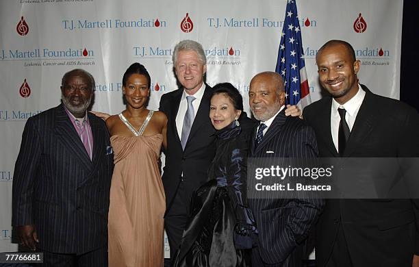 Clarence Avant, Nicole Avant, Bill Clinton, Jacquelyn Avant, Berry Gordy and Alex Avant at the T.J. Martell Foundation's 31st Annual Awards Gala at...