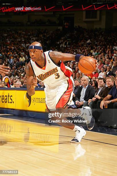 Al Harrington of the Golden State Warriors drives to the basket during the game against the Utah Jazz on October 30, 2007 at Oracle Arena in Oakland,...