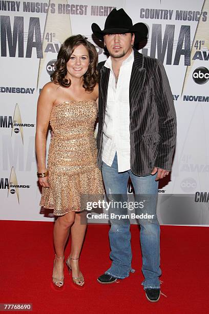 Country singer Jason Aldean and wife Jessica Aldean arrive at the 41st Annual CMA Awards at the Sommet Center on November 7, 2007 in Nashville,...