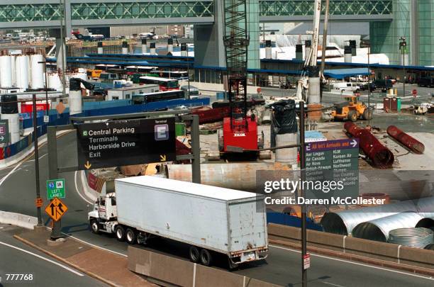 Traffic manages the maze of construction in and around Logan Airport in Boston, MA August 24, 2000. Massachusetts Port Authority officials recently...