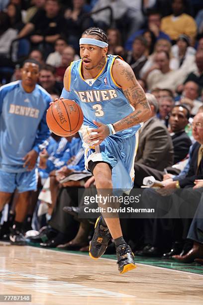 Allen Iverson of the Denver Nuggets moves the ball up court during a game against the Minnesota Timberwolves at the Target Center on November 2, 2007...