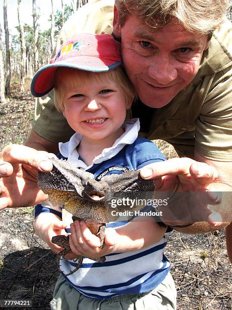 Steve Irwin poses with his son Bob at Australia Zoo August 2, 2006 in Beerwah, Australia.