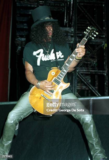 Lead guitarist Slash of "Slash's Snakepit" performs August 25, 2000 at Madison Square Garden in New York City. Slash was the lead guitarist for the...