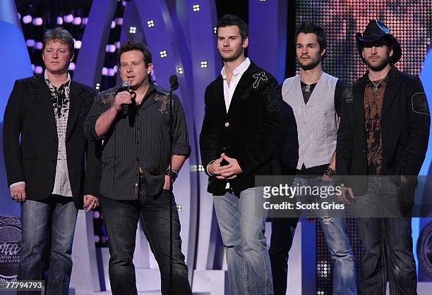Brad Mates and Emerson Drive are seen on stage at the 41st Annual CMA Awards at the Sommet Center on November 7, 2007 in Nashville, Tennessee.