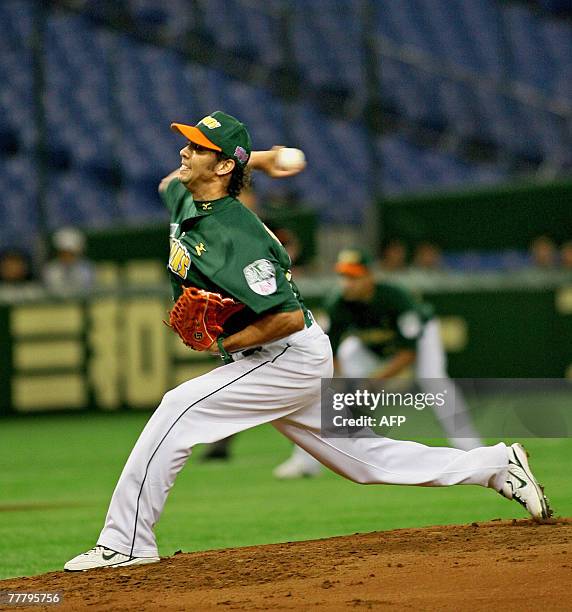 Taiwan's Uni-President Lions starting pitcher Figueroa Nelson throws during their Konami Cup Asia Series 2007 baseball tournament game against...