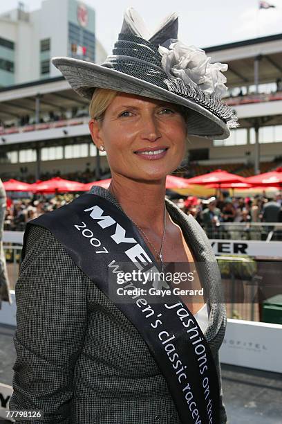 Winner of the Fashions On The Field best dressed award, Lorraine Cookson poses during the Myer Fashions On The Field event on Crown Oaks Day as part...