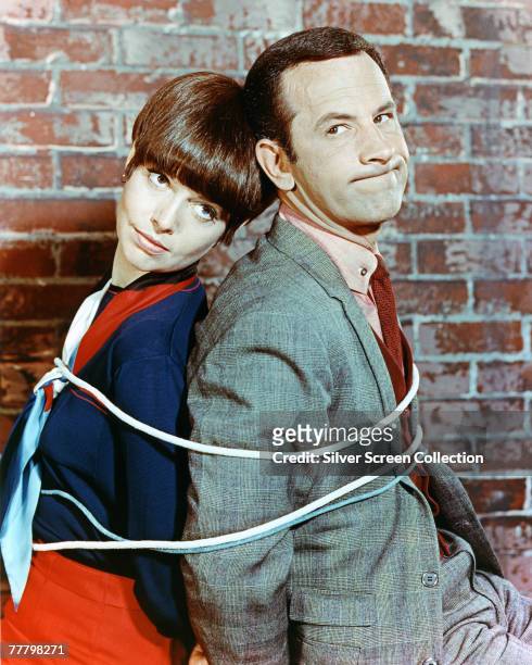 Don Adams as Maxwell Smart/Agent 86 and Barbara Feldon as Agent 99 in the television series 'Get Smart', circa 1965.