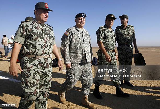 Lieutenant General Steven Whitcomb , US third Army Commanding General, leaves with Egyptian Chief of Military Staff Lieutenant General Sami Enan...
