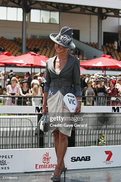 Winner of the Fashions On The Field best dressed award, Lorraine Cookson poses during the Myer Fashions On The Field event on Crown Oaks Day as part...