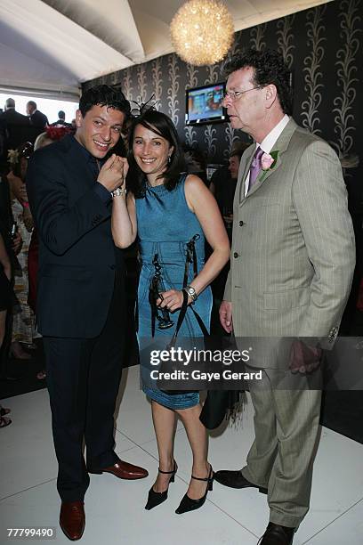 Singer Patrizio Buanne and radio host Red Symons during Crown Oaks Day as part of the Melbourne Cup Carnival 2007 at Flemington Racecourse on...