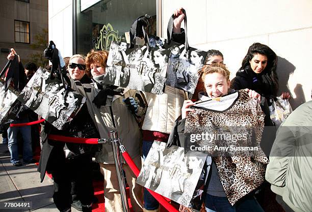 Fans wait outside to get first look at the launch of designer Roberto Cavalli's new collection at H&M held at the H&M on 5th Avenue on November 8,...