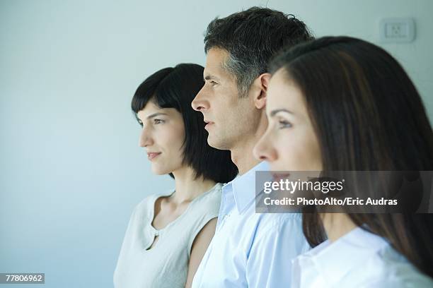 three business associates in profile, portrait, head and shoulders - blouse man stockfoto's en -beelden