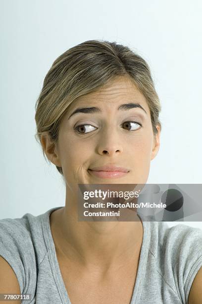 woman making face, portrait - at a glance stockfoto's en -beelden