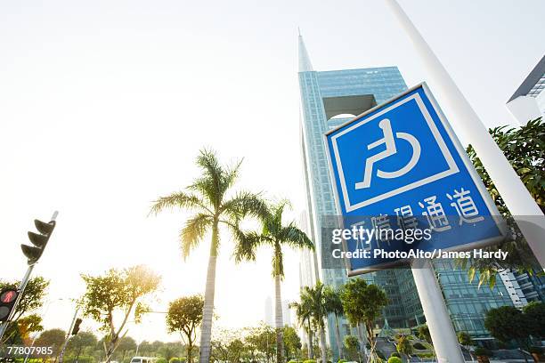 china, handicapped parking sign, low angle view - handicap parking space stock pictures, royalty-free photos & images