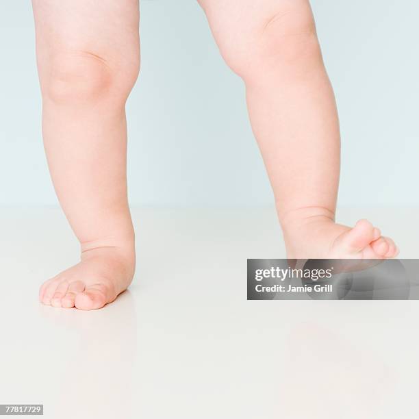 close up of baby walking - one baby girl only fotografías e imágenes de stock