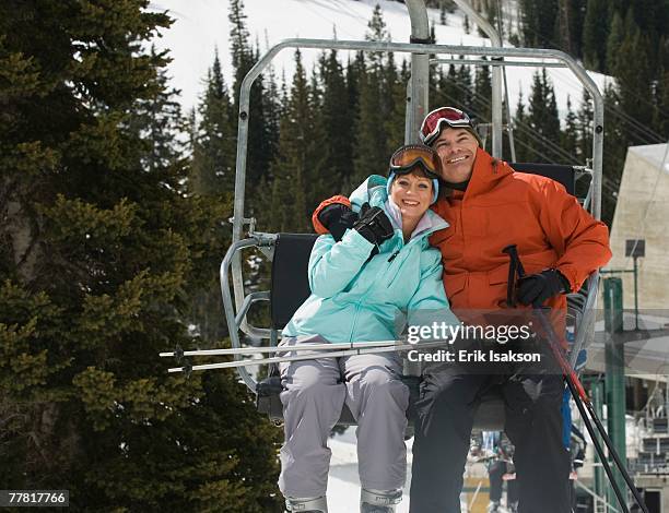 couple on ski lift - couple ski lift stockfoto's en -beelden