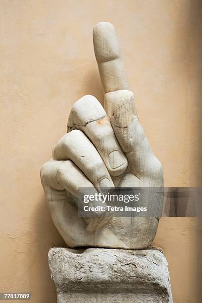 close up of the hand of constantine statue, capitoline museum, italy - musei capitolini stockfoto's en -beelden