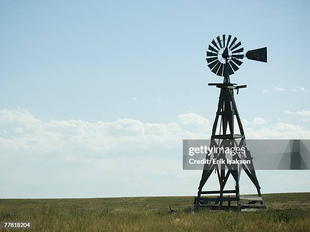 windmill in field - midwest usa stock pictures, royalty-free photos & images