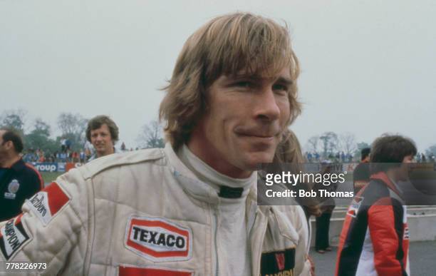 British racing driver James Hunt , driver of the Olympus Cameras Wolf Racing Wolf WR8 Ford V8, pictured beside the track prior to racing in the...